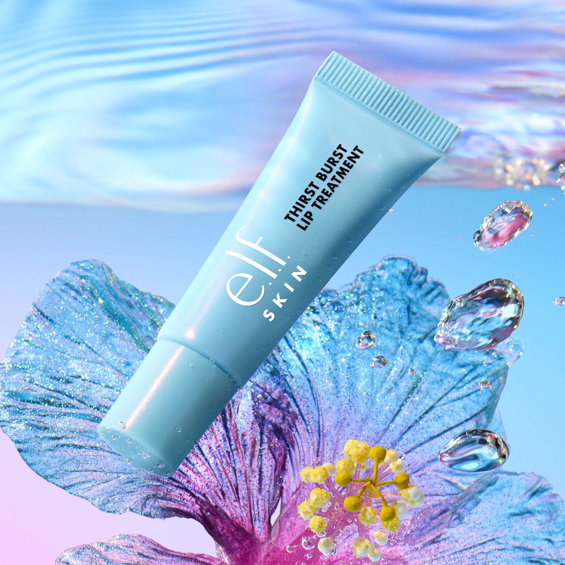 thirst-burst-lip-treatment-d9 57069_SKIN_Plumptide-Hero-BlueHibiscus_3136_MAIN_ASSETS_EDIT_20BLUE_20EXPORT_RGB_2000x2000_d9468ce8-9ad3-4ff9-a951-b48719cf5459.jpg
